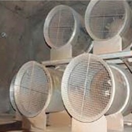 Auxiliary Ventilation Fans A group of fans that are sitting in the air.